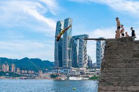 People Dive Along The Yangtze River in Chongqing