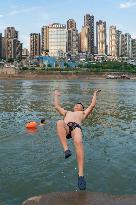 People Dive Along The Yangtze River in Chongqing