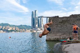 People Dive Along The Yangtze River in Chongqing