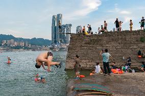 People Dive Along The Yangtze River in Chongqing