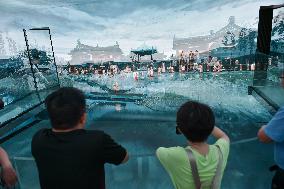 Tourists View Panoramic Animation in Nanjing