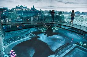 Tourists View Panoramic Animation in Nanjing