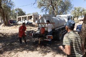 Organisation in the mountain village after the earthquake - Tafeghaghte