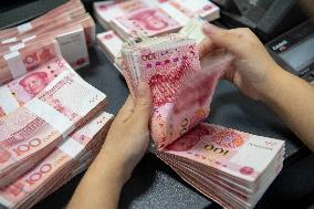 The People's Bank of China Lowered The Reserve Requirement Ratio For Financial Institutions