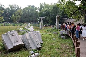 Visitors Visit The Old Summer Palace Ruins Park in Beijing, China