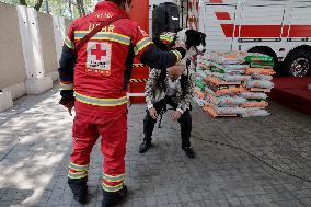 Mexican Red Cross Hands Over Donations To Canine Binomial Members Of The Search And Rescue Team In Collapsed Structures