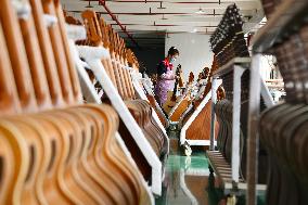 CHINA-BELT AND ROAD INITIATIVE-GUITAR-MAKING INDUSTRY (CN)