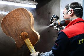 CHINA-BELT AND ROAD INITIATIVE-GUITAR-MAKING INDUSTRY (CN)