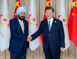 CHINA-ZHEJIANG-HANGZHOU-XI JINPING-OCA ACTING PRESIDENT-MEETING (CN)