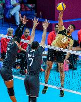 Bahrain v Qatar- The 19th Asian Games Volleyball Match