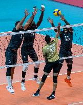 Bahrain v Qatar- The 19th Asian Games Volleyball Match