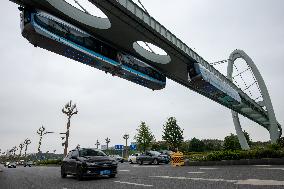 CHINA-HUBEI-WUHAN-COMMERCIAL SUSPENDED MONORAIL LINE-OPERATION (CN)