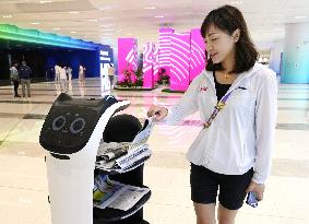 Asian Games: Newspaper delivery robot