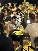 Jean-Claude Van Damme During A Dinner With Friends - Italy