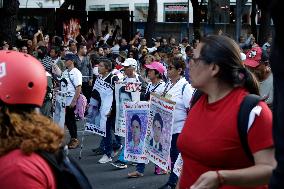 Relatives Of The 43 Normalist Students Of Ayotzinapa Protest To Demand Justice After 9 Years