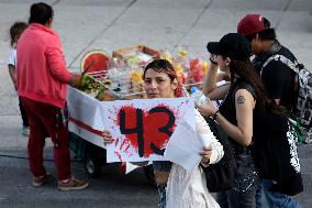 Relatives Of The 43 Normalist Students Of Ayotzinapa Protest To Demand Justice After 9 Years