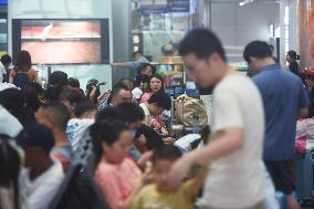 Passengers Wait For The Train at Hangzhou East Railway Station