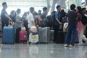 Passengers Wait For The Train at Hangzhou East Railway Station