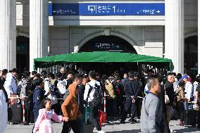 Tourists Line Up at Changchun Railway Station in Changchun