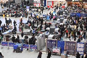 Tourists Line Up at Changchun Railway Station in Changchun