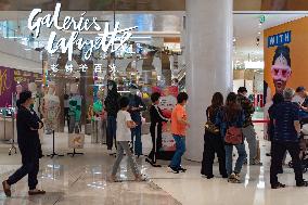 Tourists Shop at The Newly Opened Galeries Lafayette Department Store in Chongqing