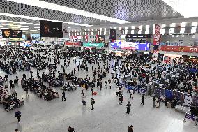 Tourists Line Up at Changchun Railway Station in Changchun