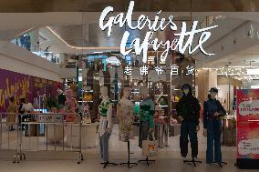Tourists Shop at The Newly Opened Galeries Lafayette Department Store in Chongqing