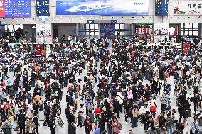 Tourists Line Up at Changchun Railway Station in Changchun