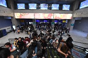 Tourists Line Up at Changchun Railway Station in Changchun