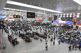 Tourists Line Up at Changchun Railway Station in Changchun