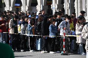 Tourists Line Up at Changchun Railway Station in Changchun