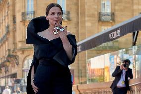 Juliette Binoche At The Red Carpet To Premier  “Aristote Luyindula” During The 71st San Sebastian International Film Festival