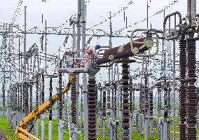 Workers Work at Taixing Substation Maintenance Site in Taizhou