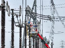 Workers Work at Taixing Substation Maintenance Site in Taizhou