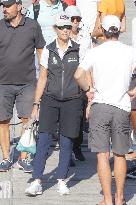 King Juan Carlos and Infanta Elena disembark at the port after the regatta