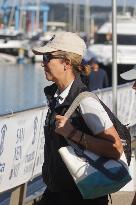 King Juan Carlos and Infanta Elena disembark at the port after the regatta