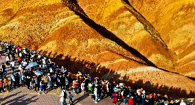 Tourists Visit Danxia Scenic Spot in Zhangye