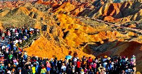 Tourists Visit Danxia Scenic Spot in Zhangye