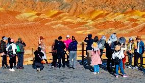 Tourists Visit Danxia Scenic Spot in Zhangye