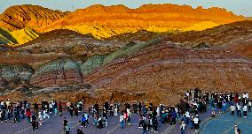 Tourists Visit Danxia Scenic Spot in Zhangye