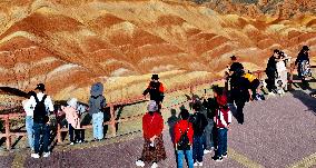 Tourists Visit Danxia Scenic Spot in Zhangye