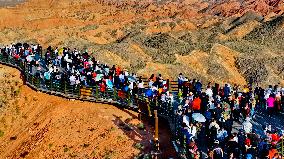 Tourists Visit Danxia Scenic Spot in Zhangye