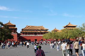 Tourists Visit The Forbidden City in Beijing