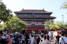 Tourists Visit The Forbidden City in Beijing