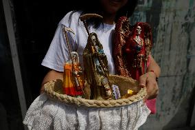 Followers Of Santa Muerte In Mexico Visit Her Temple In Tepito