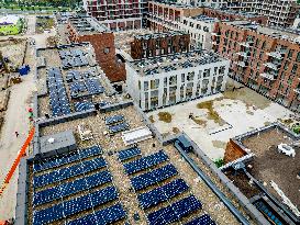 Solar Panels On The Roofs Of New Homes Under Construction - Utrecht