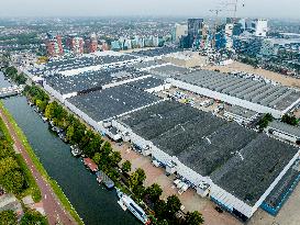 Solar Panels On The Roofs Of New Homes Under Construction - Utrecht