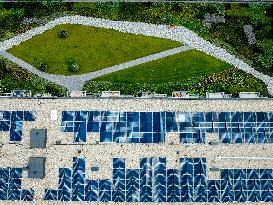 Solar Panels On The Roofs Of New Homes Under Construction - Utrecht