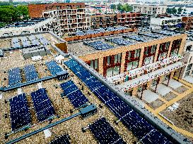 Solar Panels On The Roofs Of New Homes Under Construction - Utrecht