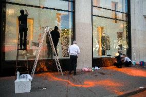 Activists Spray Louis Vuitton Window With Orange Paint - Paris